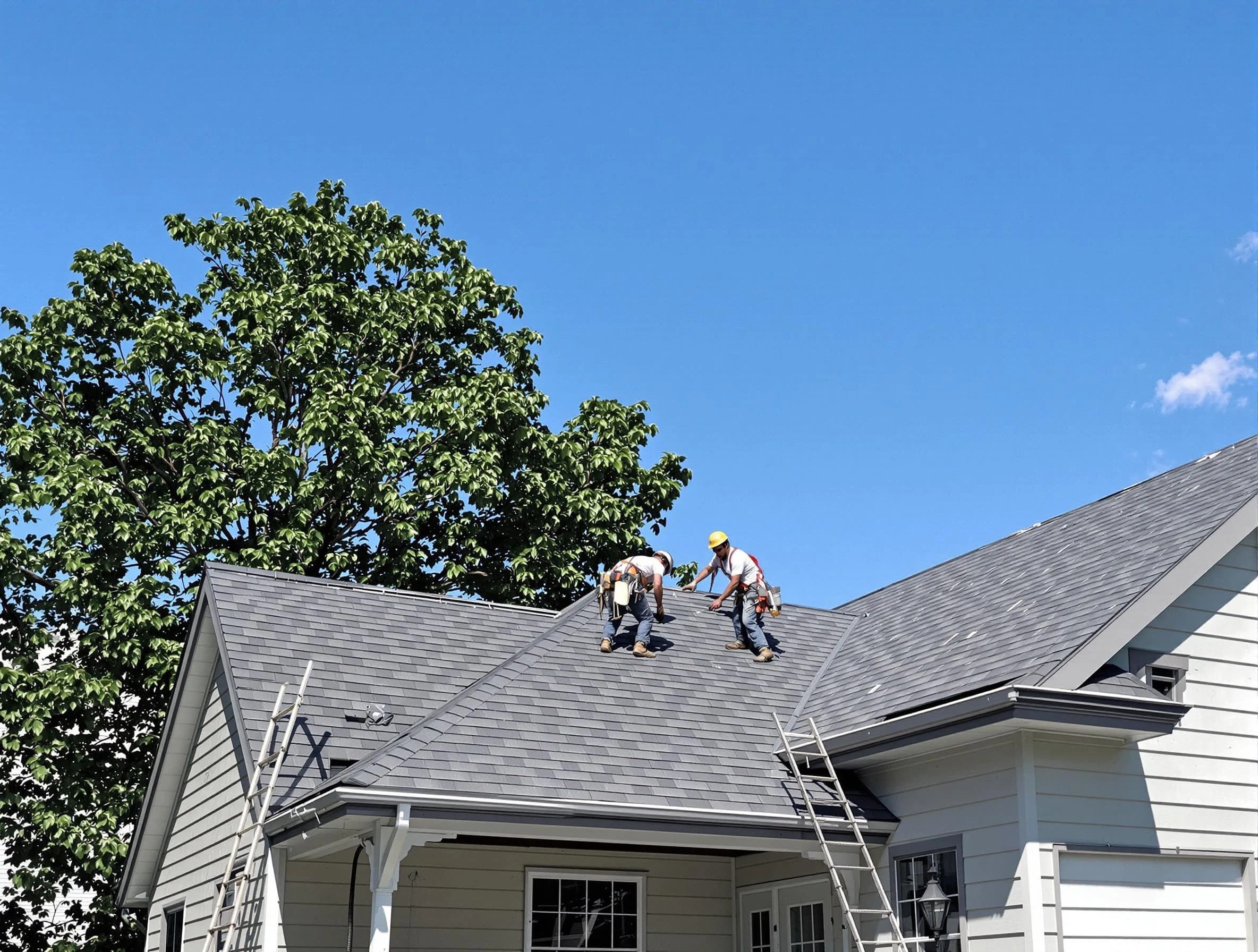 Aurora Roofing Company crew finalizing a roof installation in Aurora, OH