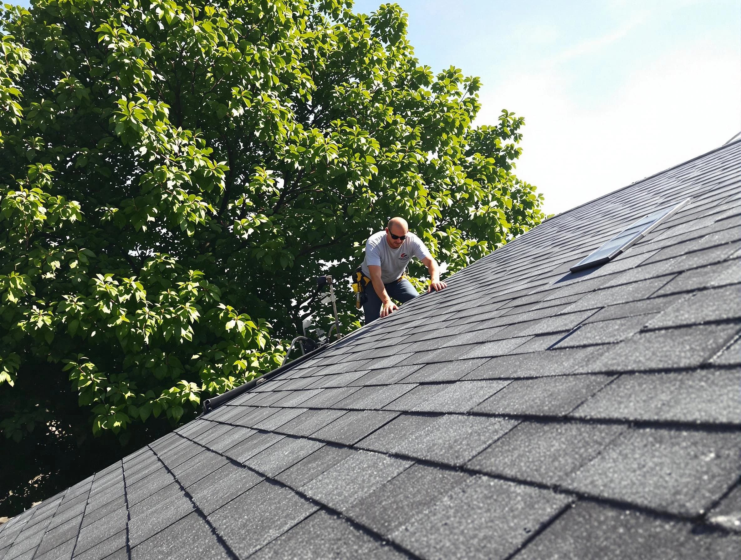 Certified roofers from Aurora Roofing Company working in Aurora, OH